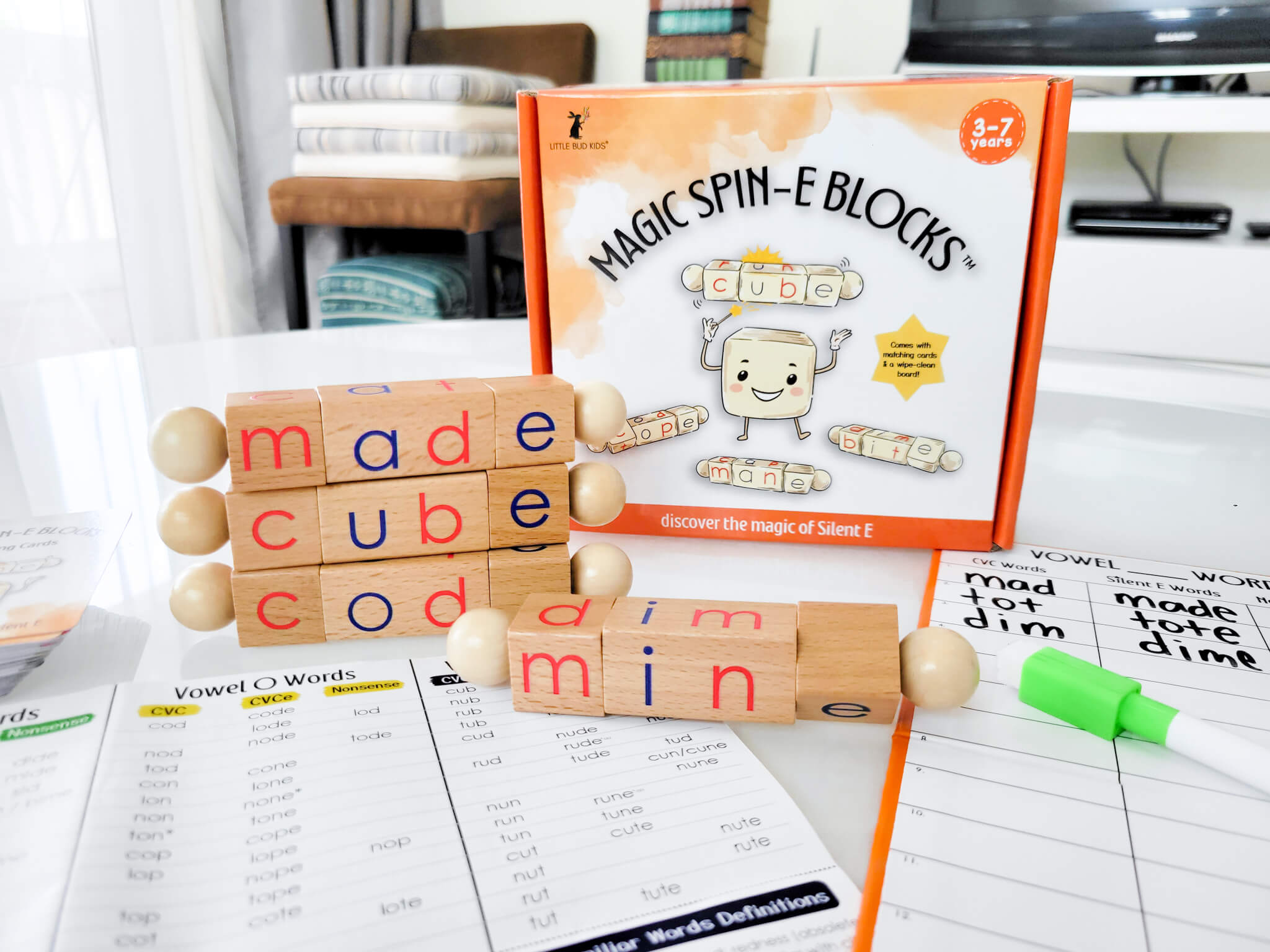 Magic Spin-E Blocks phonics kit for ages 3–7 with rotating wooden letter blocks, silent E word worksheets, and vowel sound charts teach CVC to CVCE word transformations like code, mine, and cube